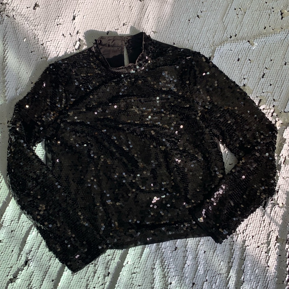 Long sleeved sequined shirt